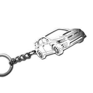 May include: A silver-coloured metal keyring featuring a flat, laser-cut silhouette of a saloon car. The design includes detailed outlines of the headlights, grille, wheels, and body panels, attached to a standard circular split ring by a short chain.