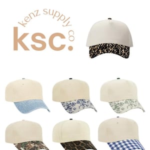 May include: Seven baseball caps with cream-colored crowns and varied brims, including leopard print, light blue denim, blue floral, green floral, camouflage, brown animal print, and blue gingham. The text kenz supply co ksc is visible.