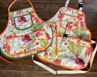 The Original Harvest Thyme Apron by Mary's Harvest Thyme Aprons™ copyright since 1997 "Mom and Me " Garden veggies