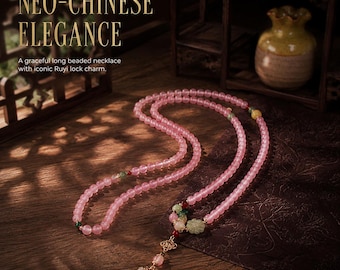 May include: A long beaded necklace featuring translucent pink spherical beads, accented with smaller green and red beads, and a central Ruyi lock charm. The text NEO-CHINESE ELEGANCE and A graceful long beaded necklace with iconic Ruyi lock charm are visible.