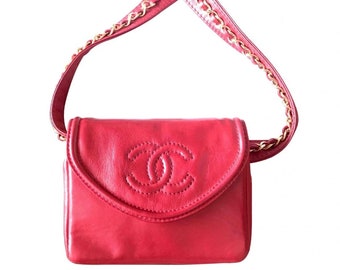 Vintage CHANEL red fanny pack, leather belt bag with detachable chain belt and CC stitch mark on flap.  Fits 29.5" -32.8"