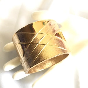 Vintage Lanvin golden thick large bangle with geometric design. 050330re2