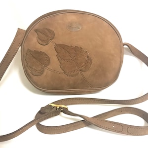 Vintage Longchamp brown suede leather oval round shape shoulder bag with leaf applique motifs. Rare and unique bag back in the old era. 0704