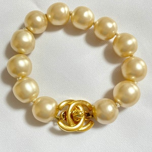 Vintage Chanel Faux Pearls and Turnlock CC Bracelet. Must Have 