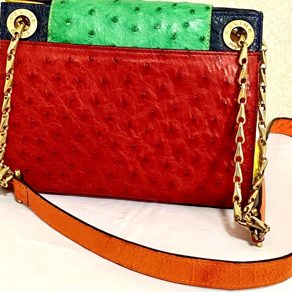 Vintage Celine genuine ostrich shoulder bag with gold tone chains and red, orange, blue, green, and yellow patchwork design. 050410ac1