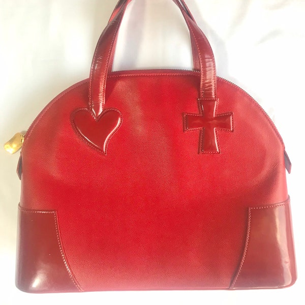 Vintage Christian Lacroix red patent enamel and leather bolide bag with golden logo zipper charm. Comes with shoulder strap. 0403172