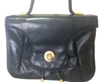 Vintage Bally black leather retro pop design bag, business purse with gold tone drawstrings and unique flap cut design.  Unisex use. 160315
