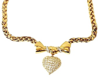 MINT. Vintage Nina Ricci golden chain statement necklace with ribbon bow and crystal stone heart pendant top. Perfect vintage jewelry.