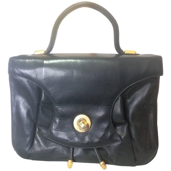 Vintage Bally black leather retro pop design bag, business purse with gold tone drawstrings and unique flap cut design.  Unisex use. 160315