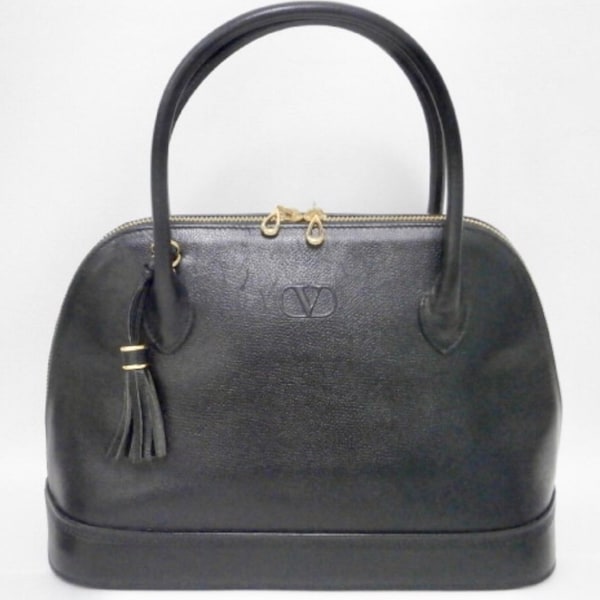 Vintage Valentino Garavani black leather bolide bag with shoulder strap, V logo, a fringe. Classic dialy use purse.