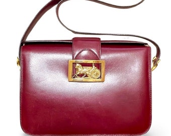 Vintage CELINE wine Bordeaux leather shoulder bag with golden carriage and logo buckle. Rare Celine leather bag.  060611ac1