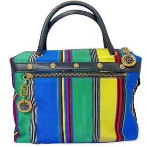 Vintage Gianni Versace duffle handbag in blue, yellow, green and other color fabric and black leather combination. 060810y1