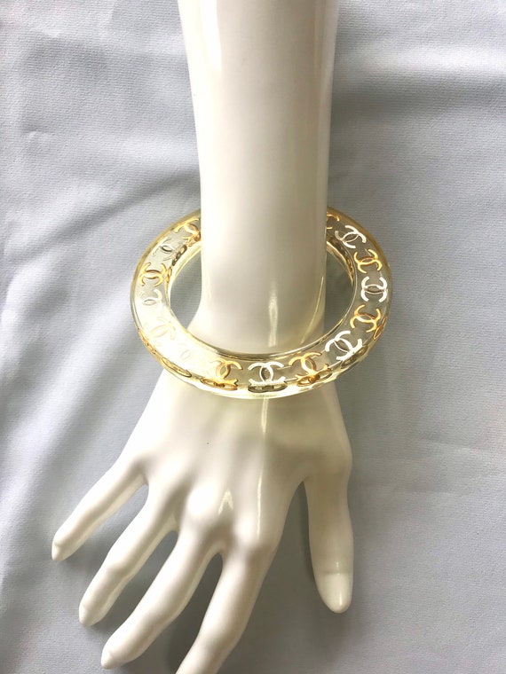 Vintage CHANEL Clear Resin Bangle Bracelet — Gold & Silver CC Vintage CHANEL Clear Resin Bangle Bracelet — Gold & Silver CC