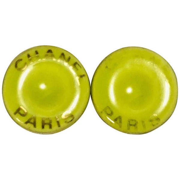 Vintage CHANEL lime yellow-green round button earrings with gold-tone logo. Rare candy-style clip-on statement jewelry. France. 0506287