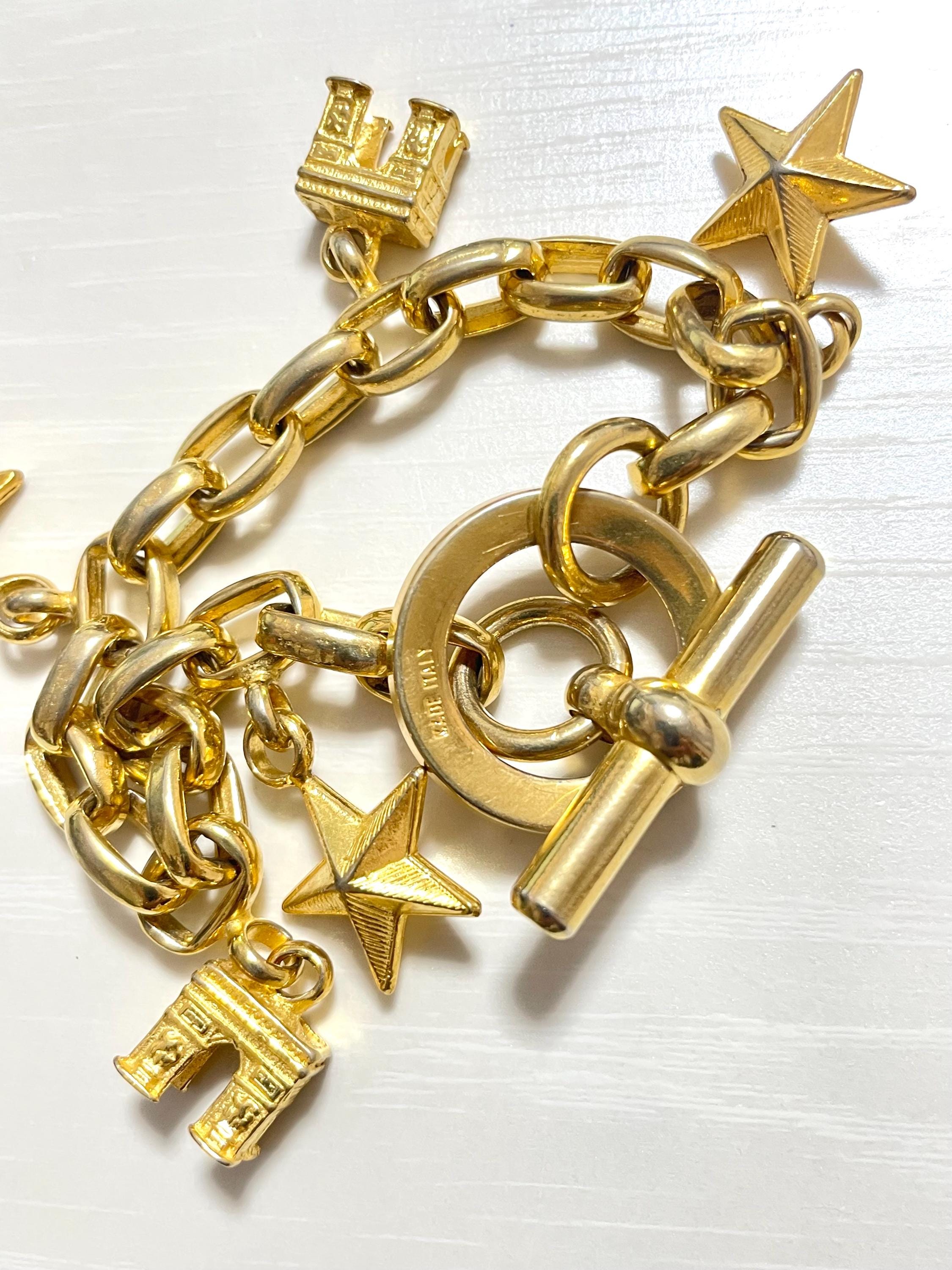 Vintage Celine Chain Bracelet With Triomphe and Star Charms. One