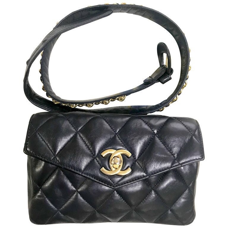 1980s. Vintage CHANEL black lamb leather belt bag, waist bag