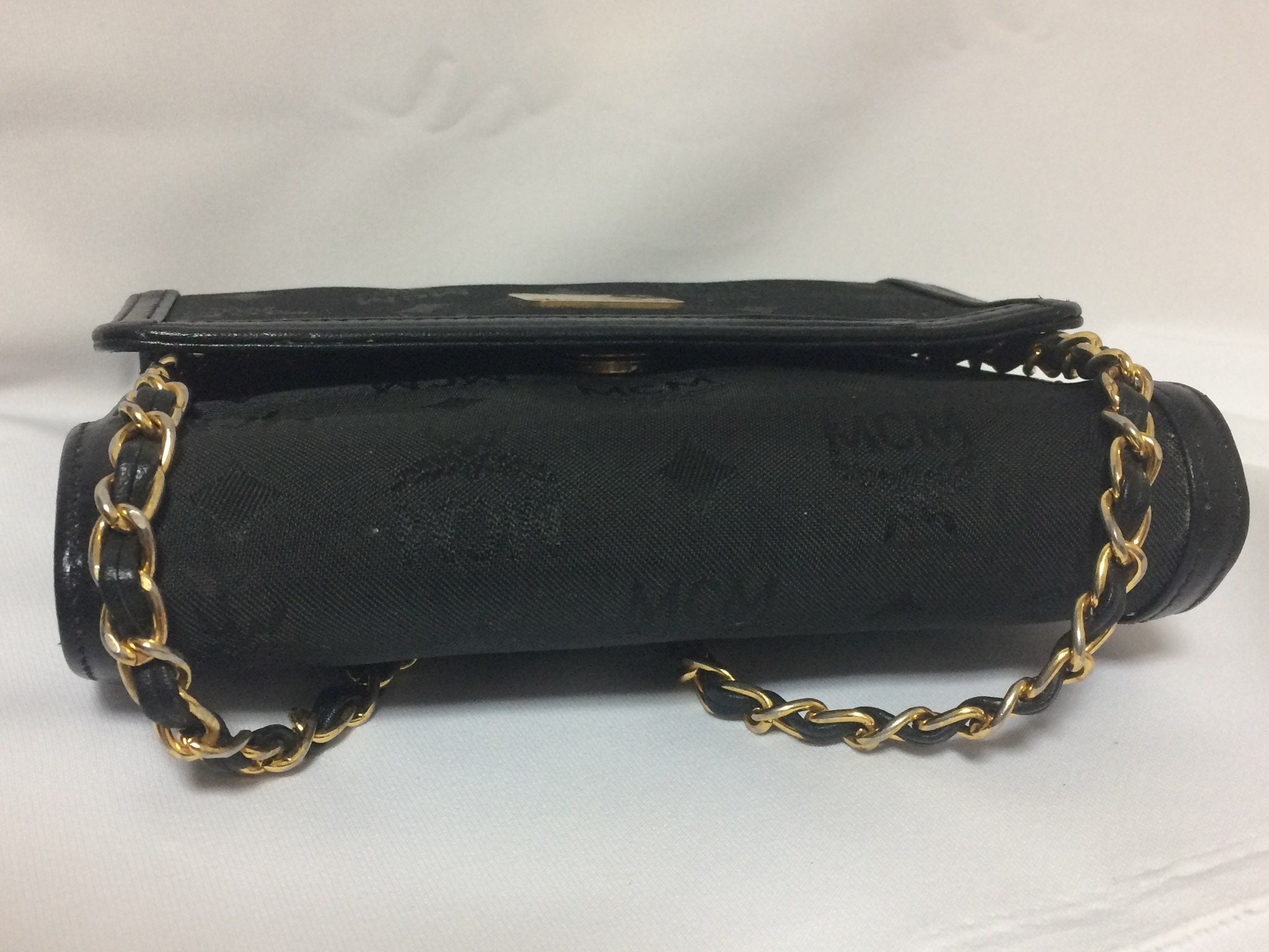 Vintage MCM black bolide style bag with gold tone metal studded charms –  eNdApPi ***where you can find your favorite designer  vintages..authentic, affordable, and lovable.