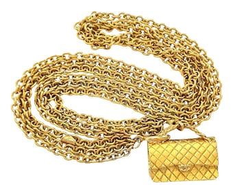 Vintage CHANEL Gold Tone Triple Chain Long Necklace with 2.55 Bag Charm Pendant. 050131ya2