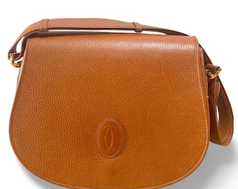 Vintage Cartier Wine Leather Clutch Bag With Gold Tone Logo Motif 