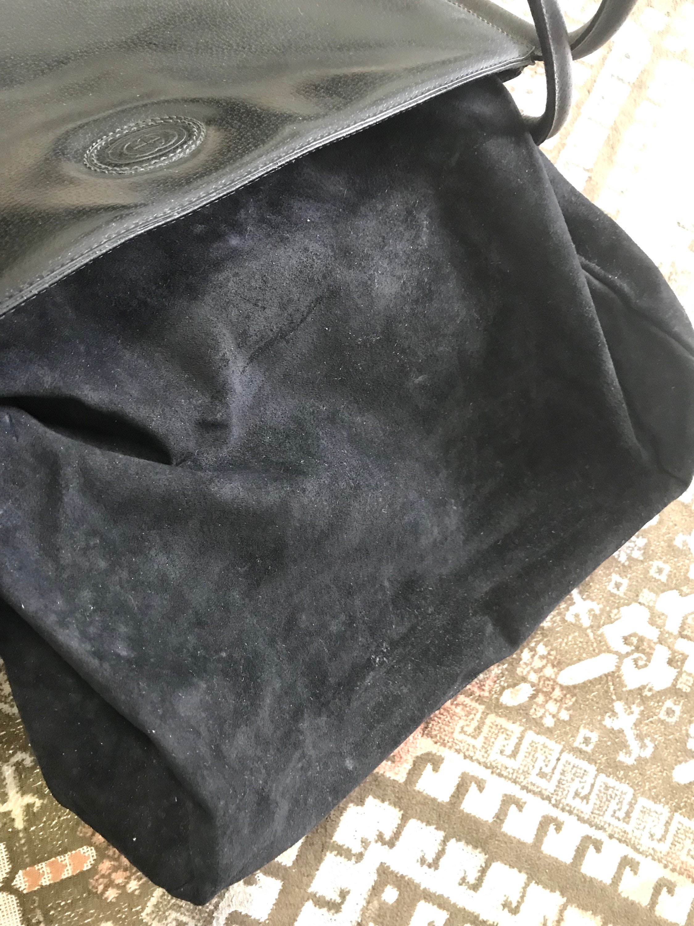Vintage Gucci Black Pigskin Large Trapezoid Shape Shoulder Bag with Embossed GG Mark. Classic Leather Purse For Daily Use.