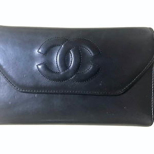 Vintage CHANEL black leather wallet with large CC stitch mark. Rare wallet from Chanel in 90’s. 050320r9