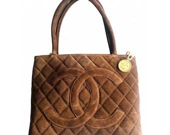 brown suede chanel backpack