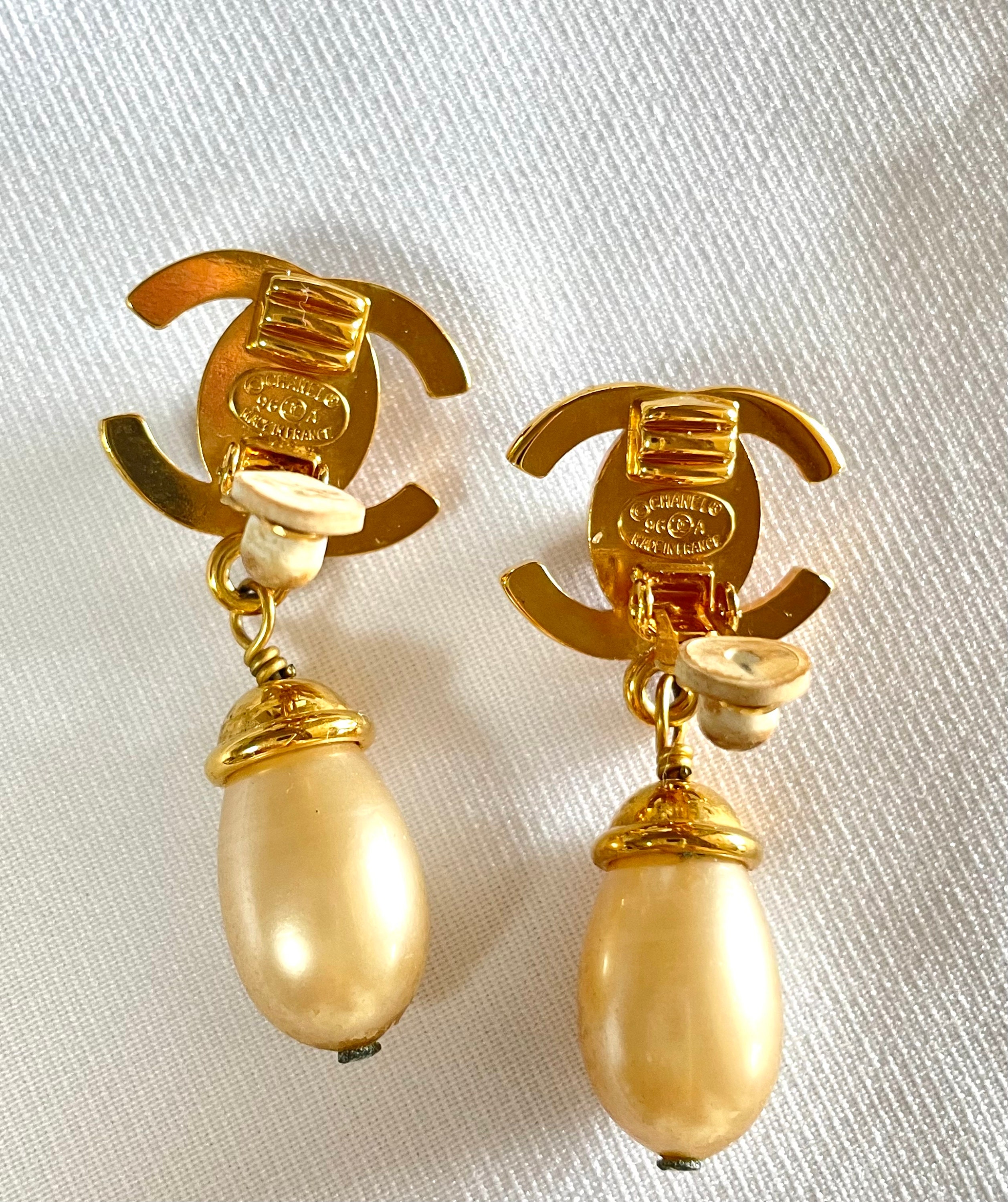 Authentic vintage Chanel earrings turnlock CC logo pearl dangle classy