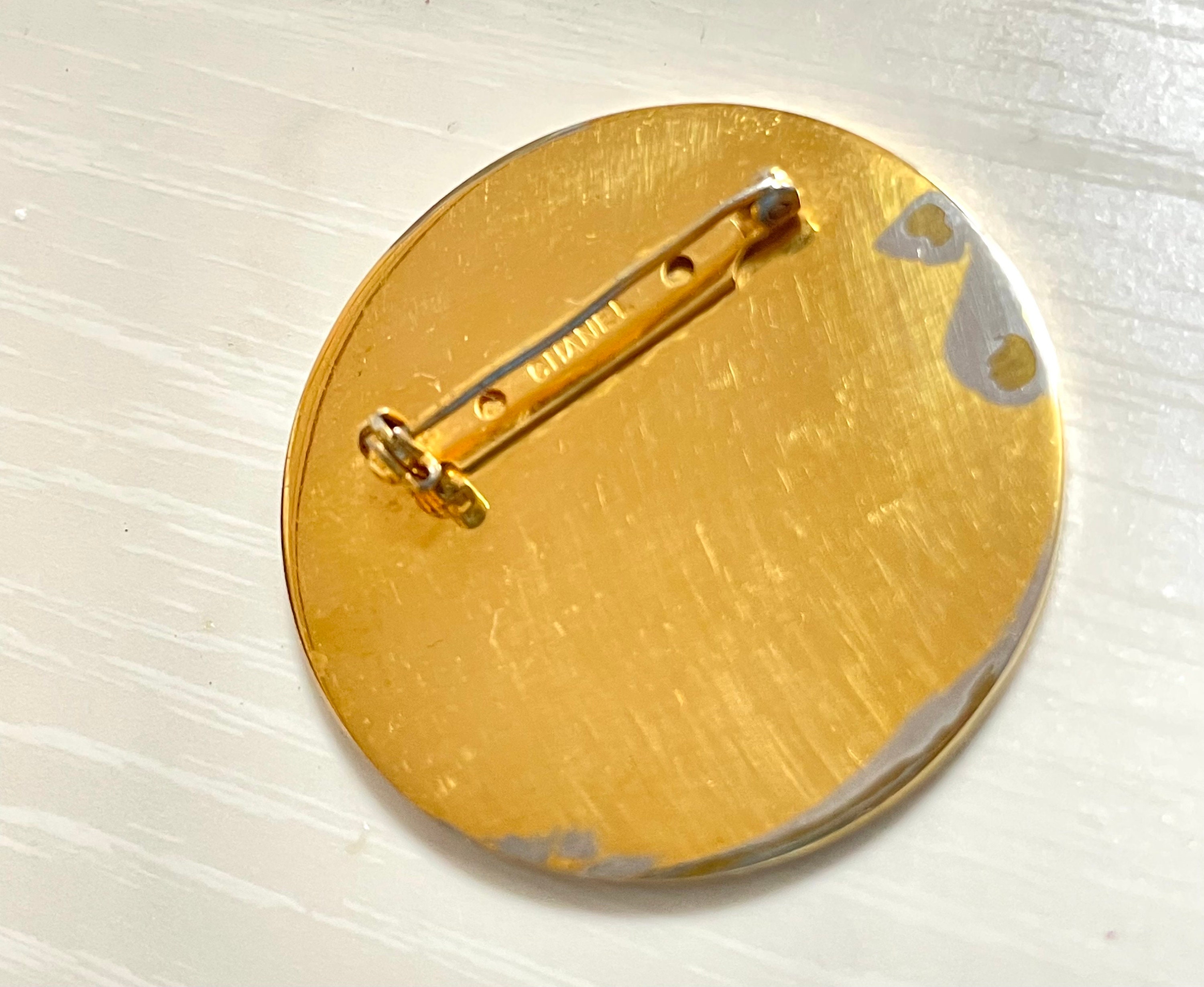 Vintage CHANEL Red and Gold Round CC Brooch — Geometric Mod Design