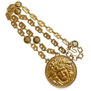 Vintage Gianni Versace Runway necklace with oversized Medusa face pendant top. Can be worn as a belt as well. 070818y1