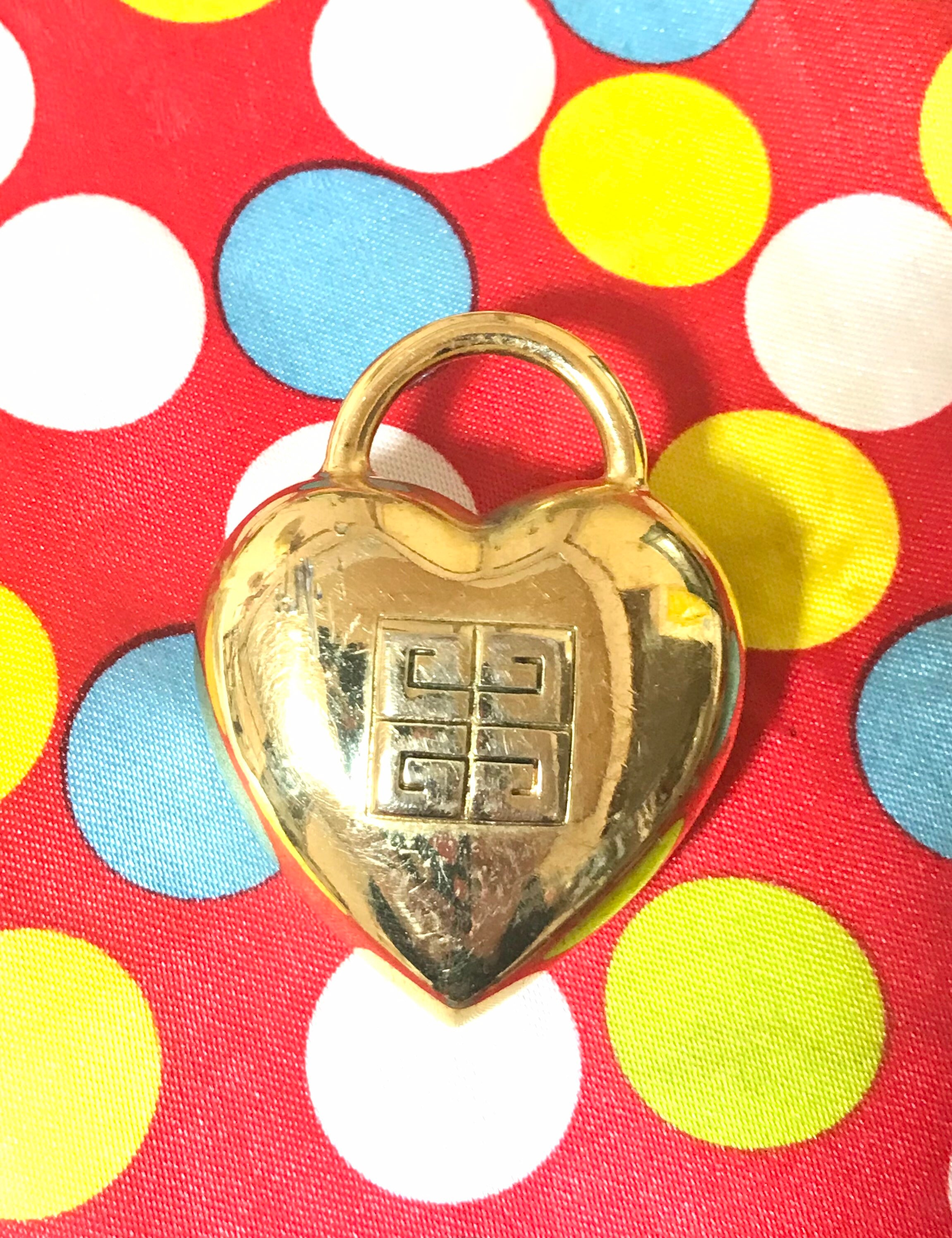 Vintage GIVENCHY Gold-tone Heart Padlock Logo Brooch. Embossed