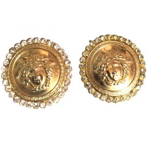 Vintage Gianni Versace large round gold tone medusa face earrings with crystal glasses. Must have Lady Gaga style jewelry piece.050320r10