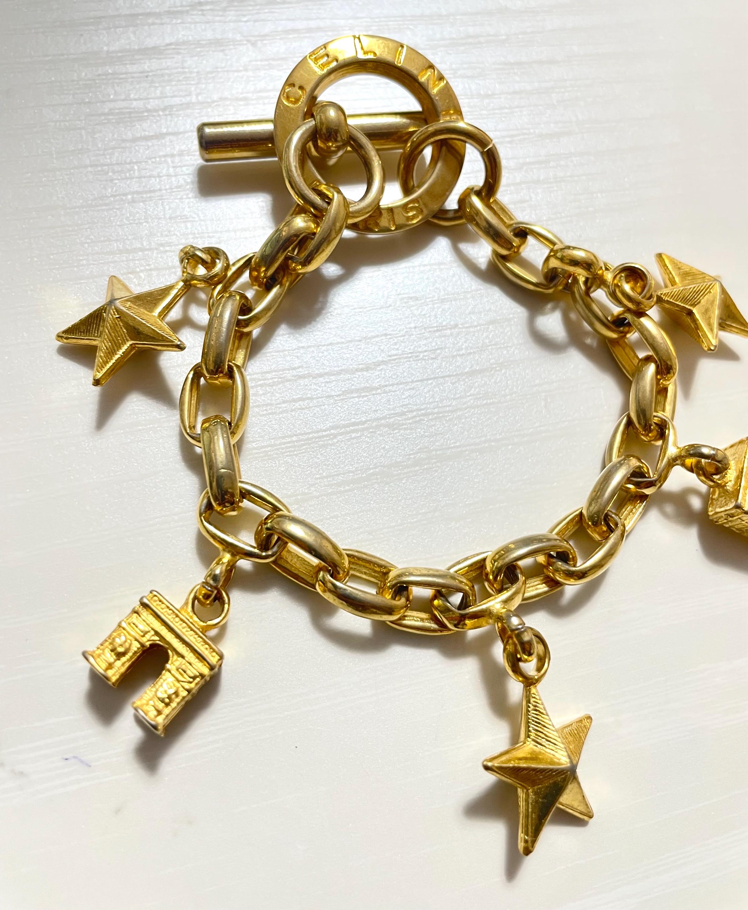 Vintage Celine Chain Bracelet With Triomphe and Star Charms. One