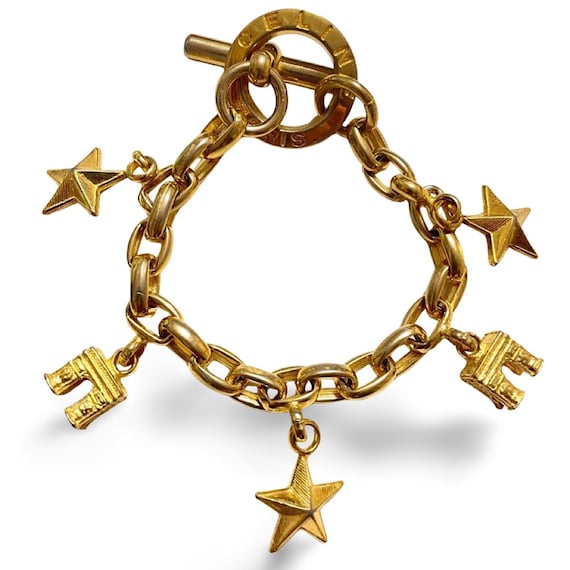 Vintage Celine Chain Bracelet With Triomphe and Star Charms. One