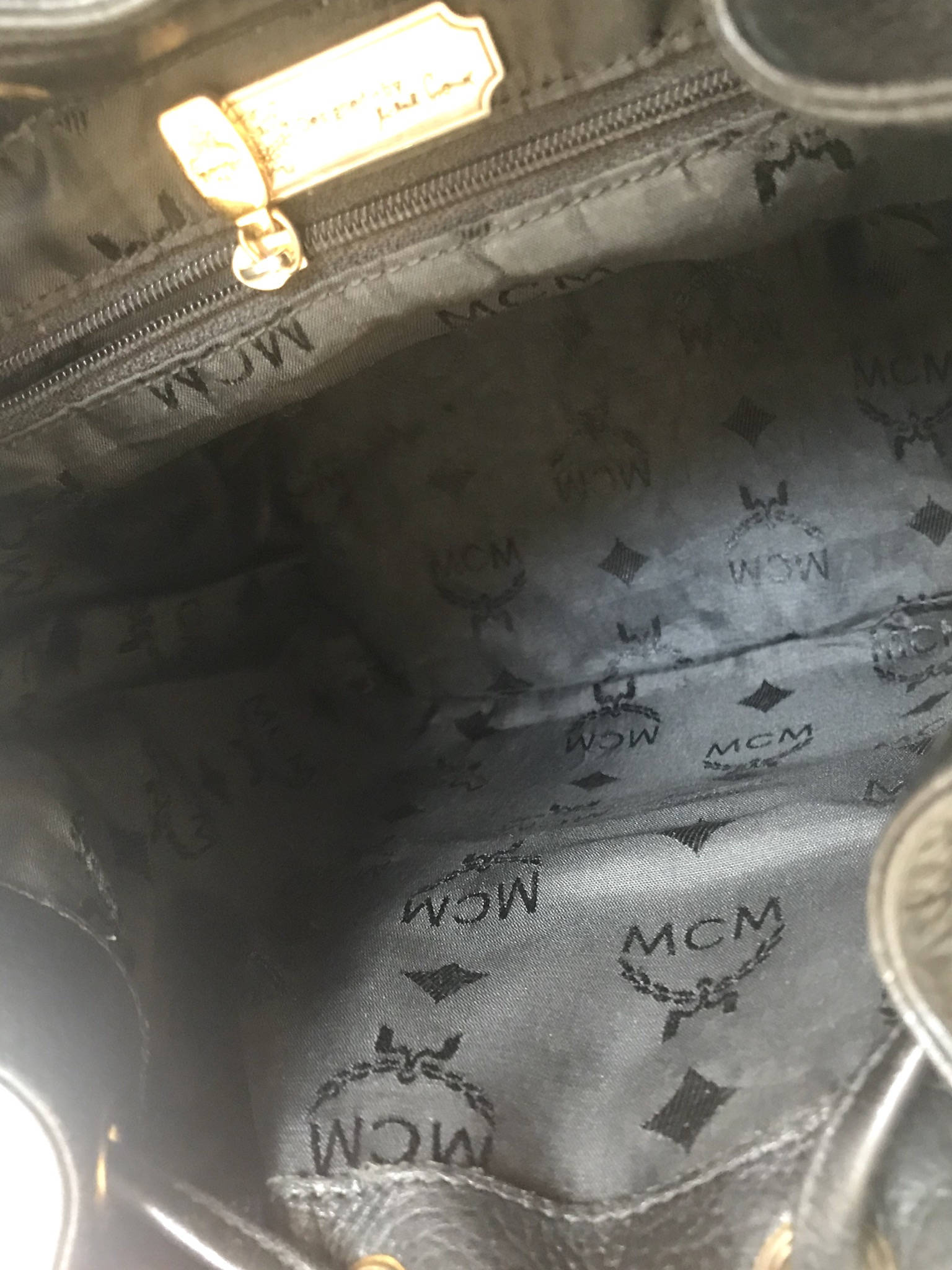 Vintage MCM Black Backpack With Golden Studded Logo Motifs 