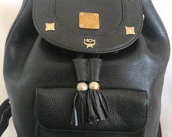 Vintage MCM Black Backpack With Golden Studded Logo Motifs  display picture 1
