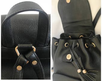 Vintage MCM Black Backpack With Golden Studded Logo Motifs  display picture 3