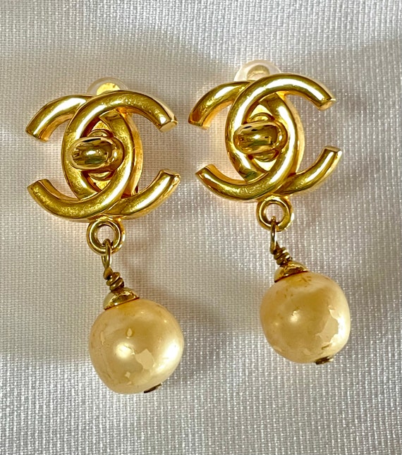 Vintage CHANEL Golden Turn Lock CC and Dangle Pearl Earrings. Very