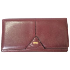 Vintage Bally wine leather clutch bag, party and classic purse with gold tone logo motif. 160623
