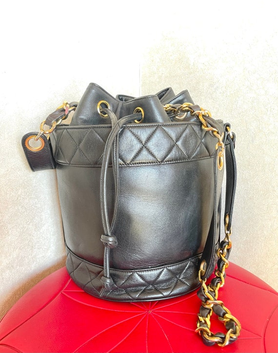 Chanel Black Quilted Caviar Micro Drawstring Bucket Bag With Chain Gold  Hardware, 2021 Available For Immediate Sale At Sotheby's