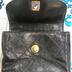 Vintage CHANEL black leather waist purse, fanny pack with golden chain belt and CC closure hock. 60-67cm, 23.526.3. 0506305 image 6