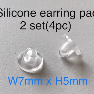 2 sets. Silicone, clear color earring pads. Will fit vintage CHANEL, HERMES earrings too.