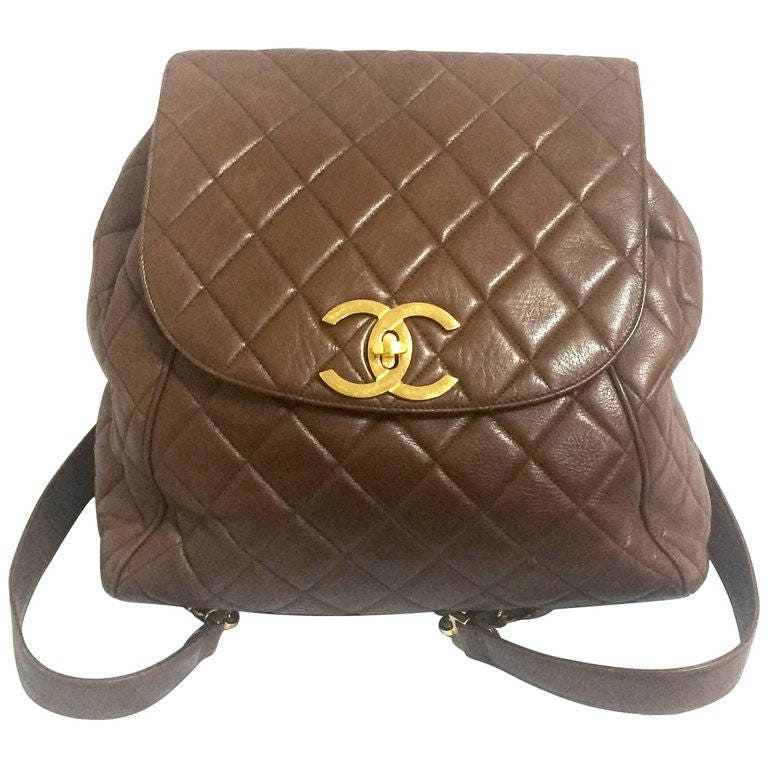 Chanel Black Lambskin Leather Flap Bag Backpack .  Luxury, Lot #79001