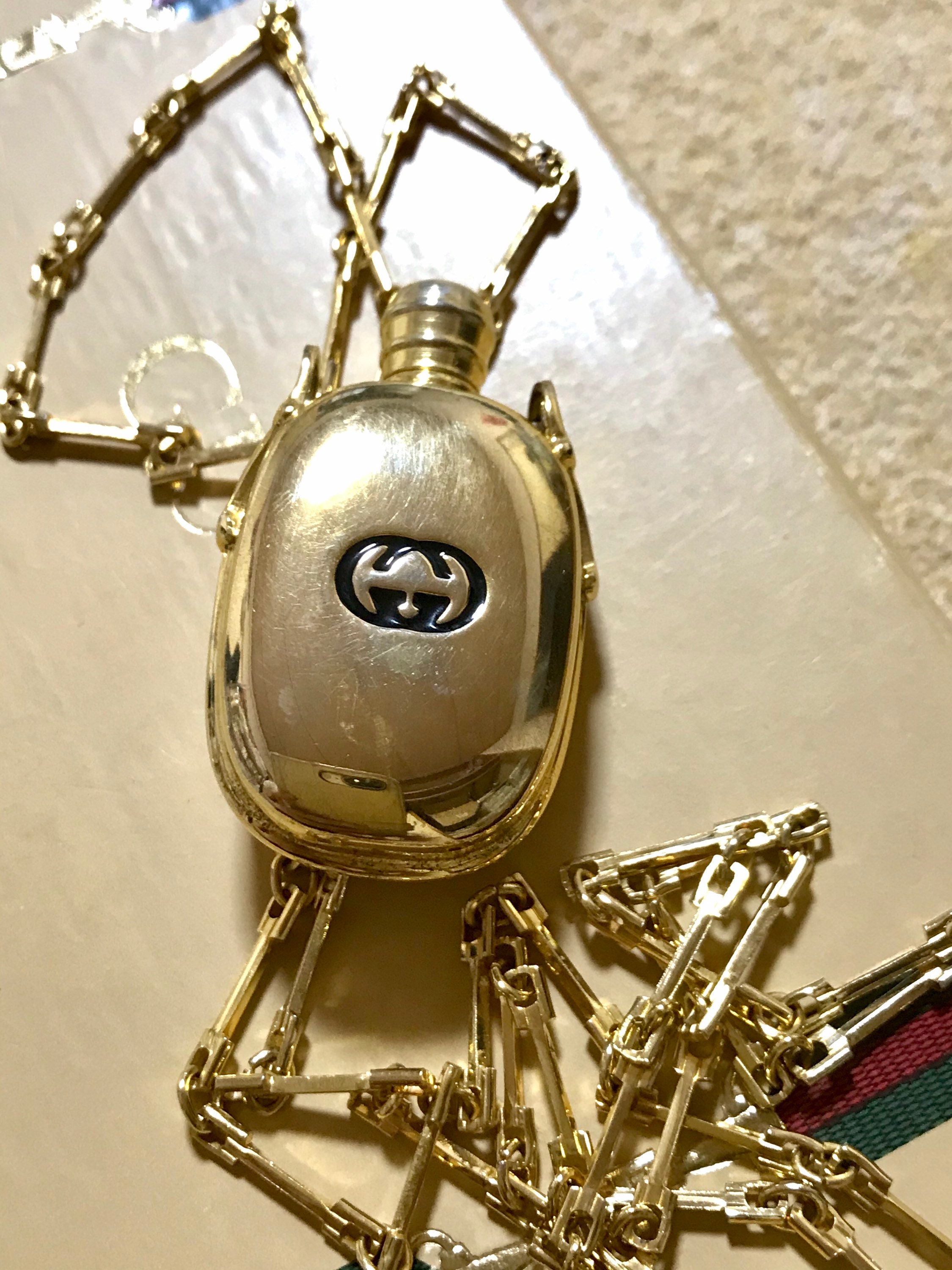 Gucci gold bottle new arrivals