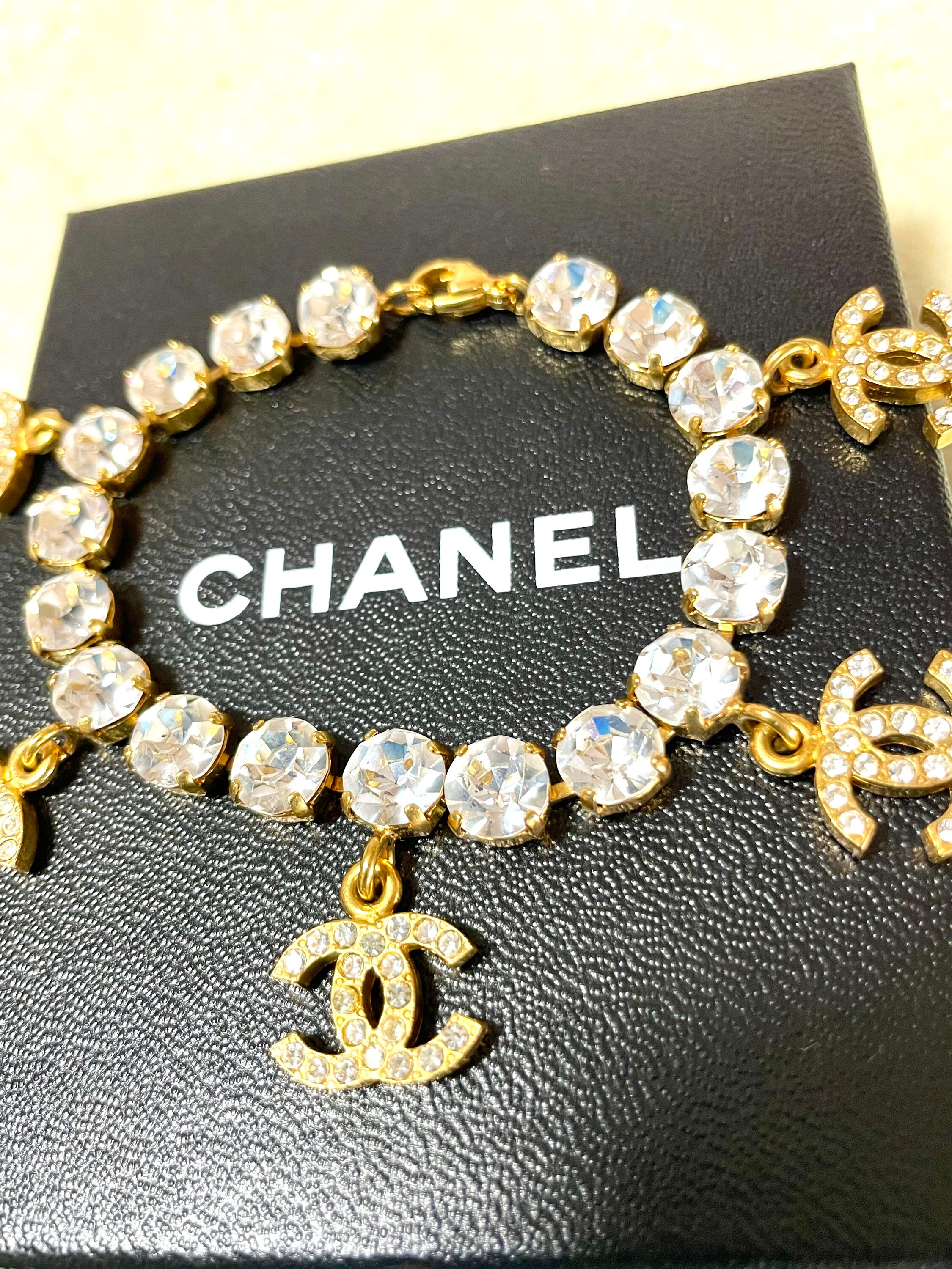 Vintage CHANEL Bracelet With Crystal Stones and CC Logo Charms
