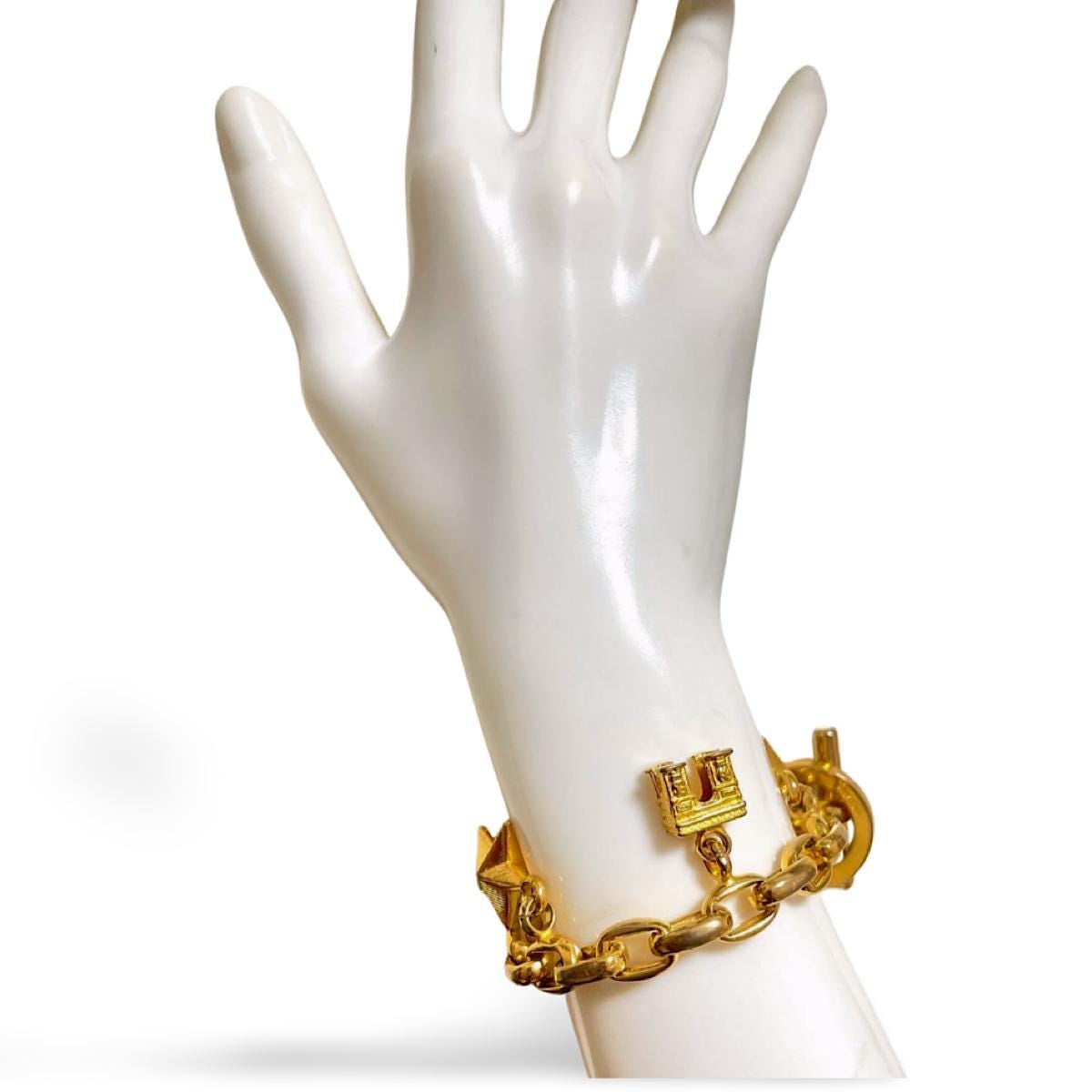Vintage Celine Chain Bracelet With Triomphe and Star Charms. One