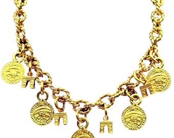 Vintage CELINE gold-tone earth coin & Triomphe charm drop necklace with twisted chains. Rare Parisian statement jewelry. 080630k1m