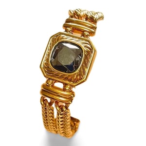 Vintage Lanvin double golden chain bracelet with gunmetalic glass stone. Made in Germany. 060326ac
