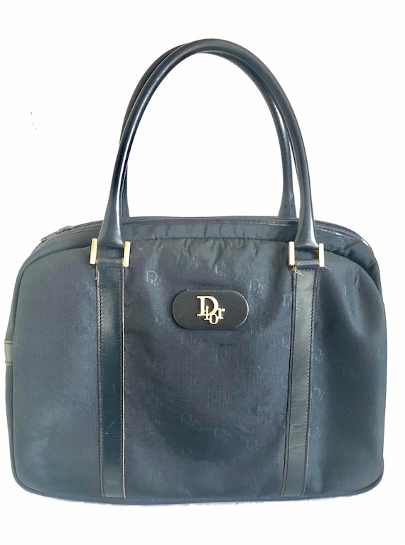 Vintage Christian Dior navy handbag with logo jacq