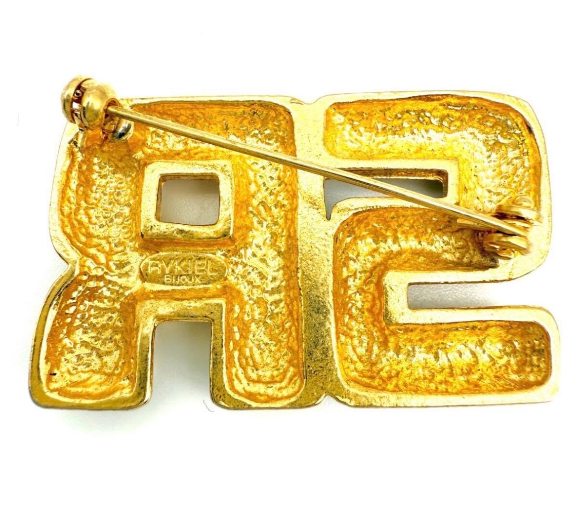 Broche Dorée Rykiel - Bijou En Alliage Doré, Occasion En Bon état