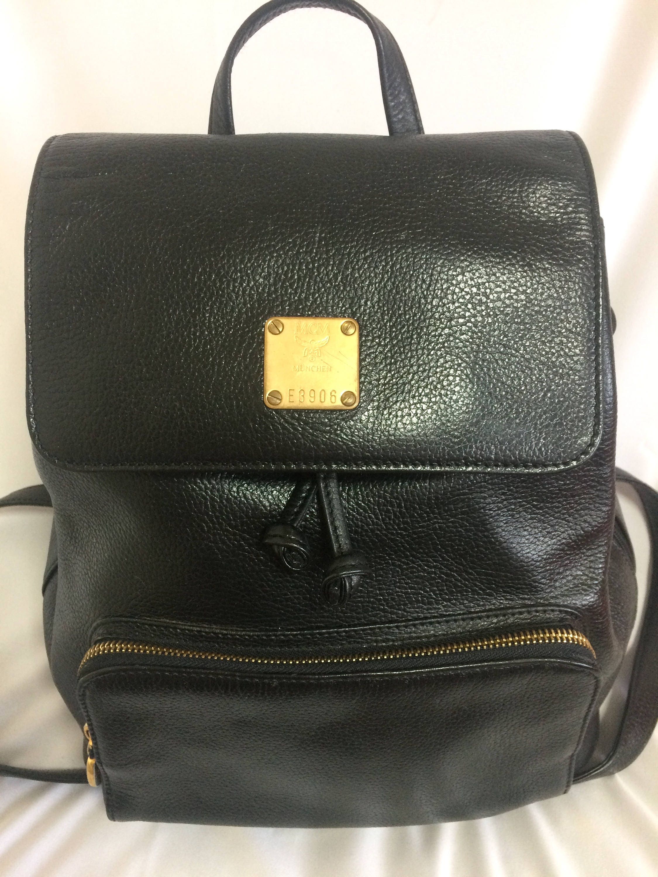 Vintage MCM black leather backpack with golden studded logo Etsy